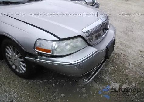 2005 Lincoln Town Car Signature z USA, uszkodzony, nr VIN 1LNHM81W65Y667135